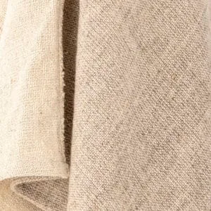 Plaid « Alita » en laine avec pompons